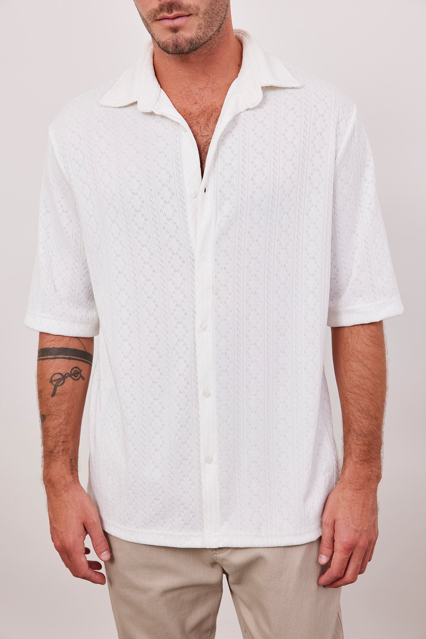 חולצה מכופתרת בטקסטורה סרוגה