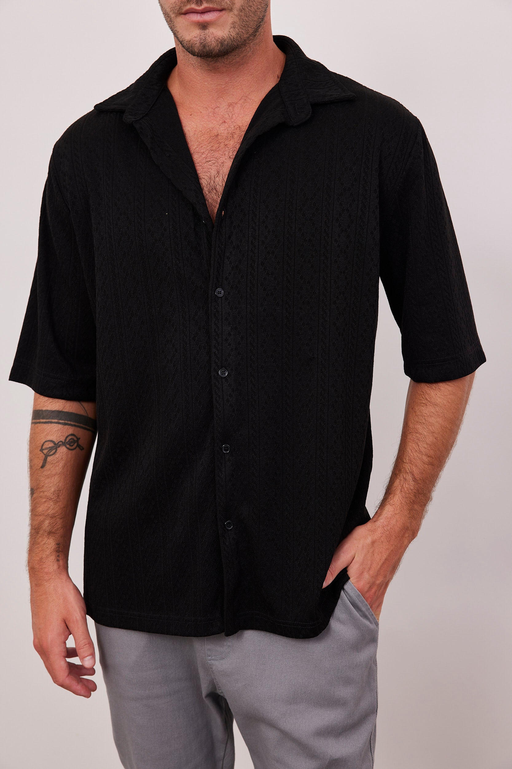 חולצה מכופתרת בטקסטורה סרוגה