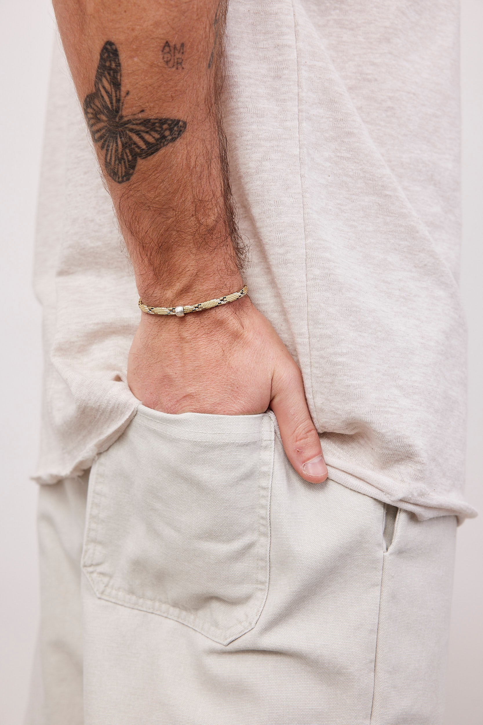 צמיד חבל בשילוב חרוז מתכת