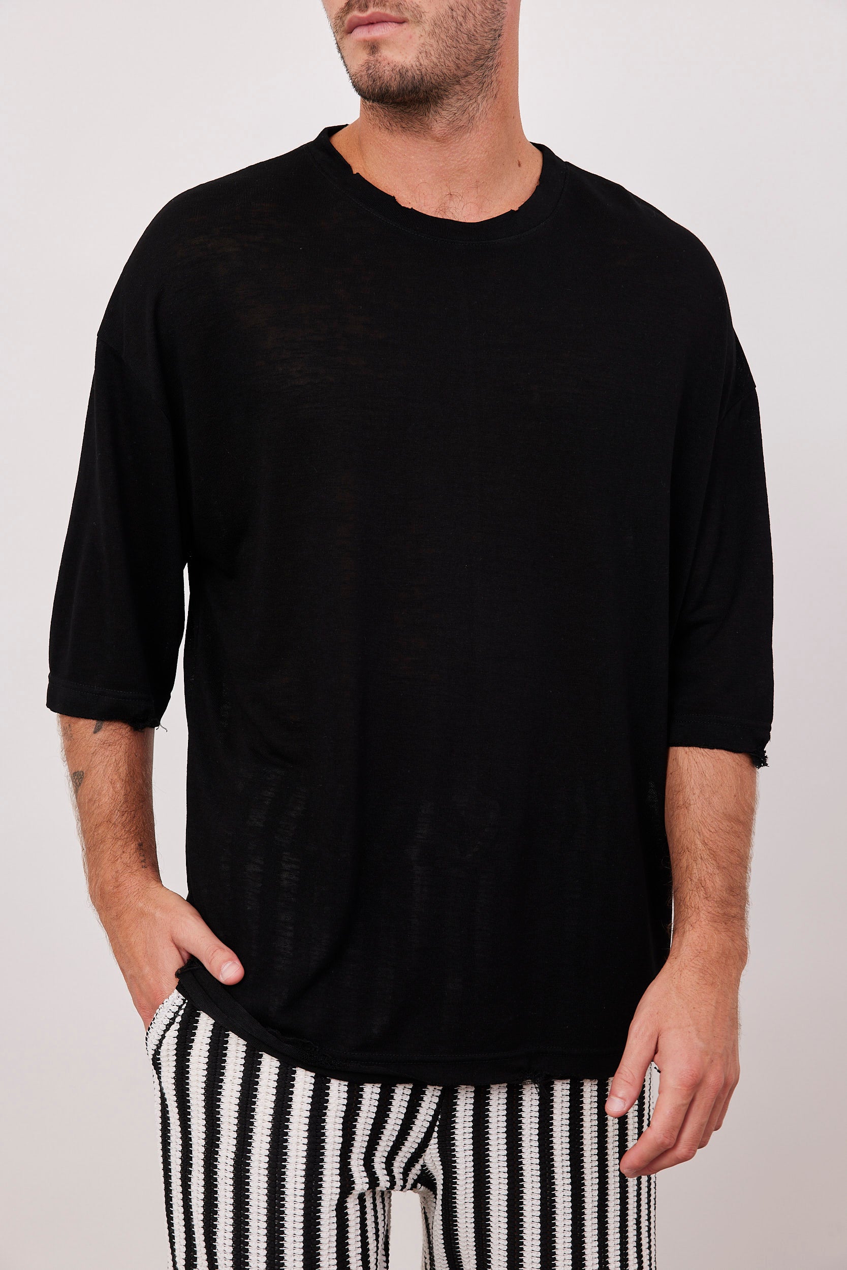 טישרט בגזרה רחבה עם קרעים