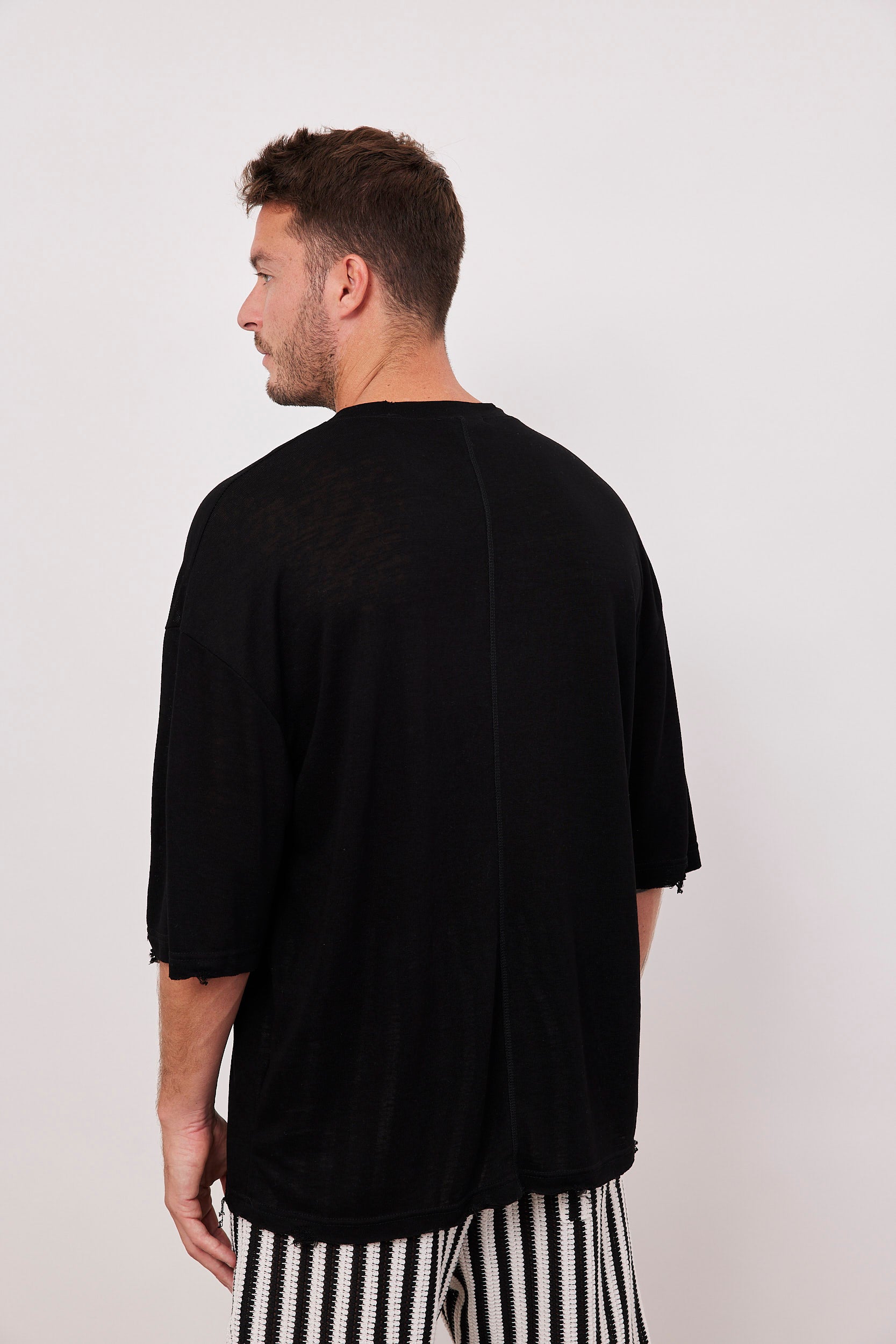 טישרט בגזרה רחבה עם קרעים