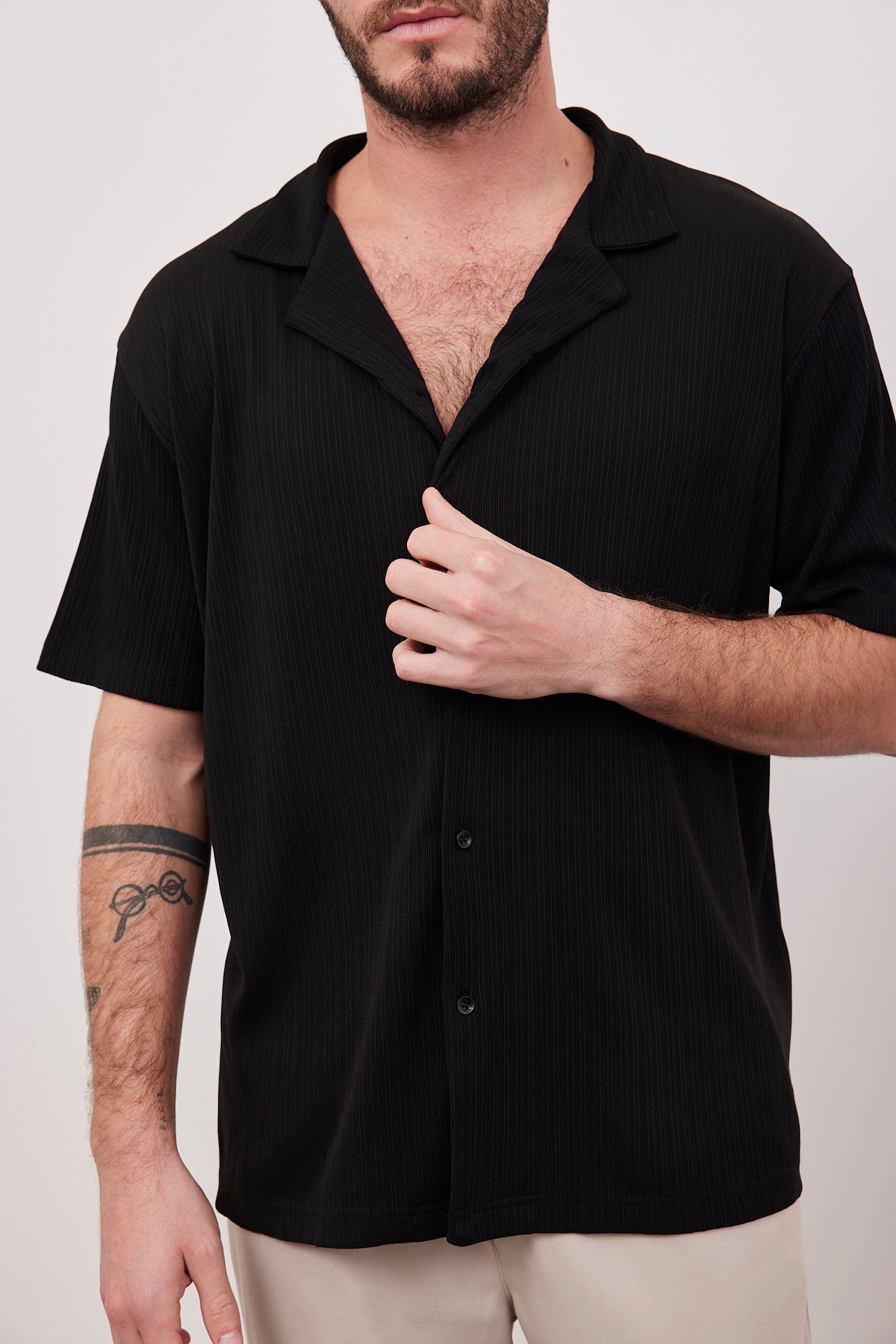 חולצה מכופתרת בטקסטורת פסים